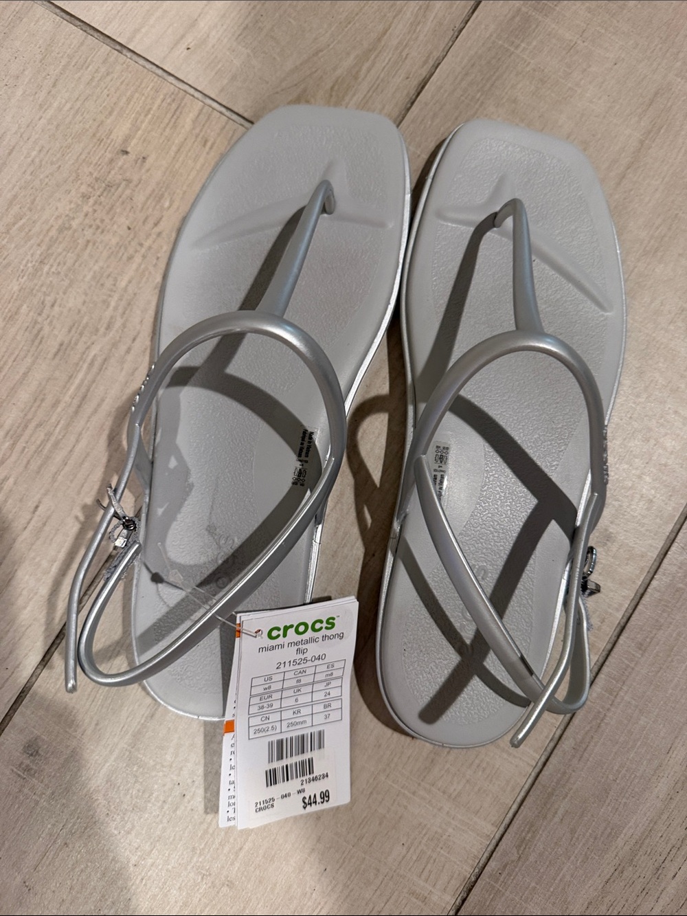 CROCS Women’s Miami Metallic Thong Sandal — Silver